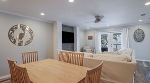 Open plan dining and living room. Plenty of seating.