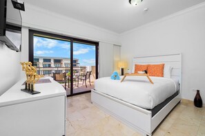 A bedroom with air-conditioning and television and an access to the balcony (Bedroom 3)