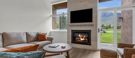 Snuggle up by the fire as you enjoy the views overlooking the golf course and Park City Mountain Base resort.