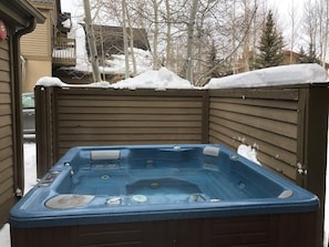 Relax and melt your stress away in the private outdoor hot tub