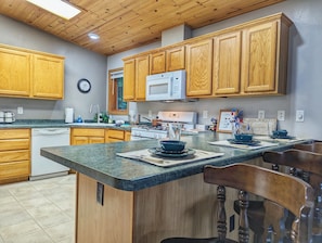 Large open kitchen with sit up counter. fully furnished with coffee nook.