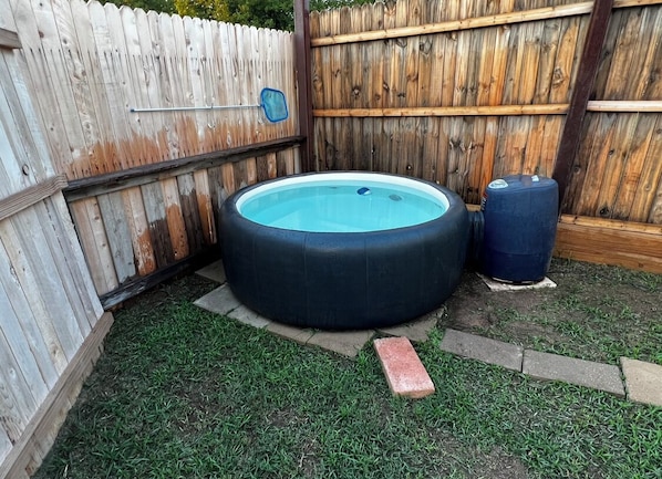 Relax in the Softub LegendĀ® 220. Accommodates up to 4 adults.