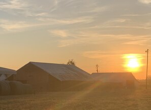 Sunset over our barns