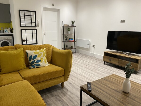 Whether you're watching TV, reading a book, or simply lounging, the living room offers a warm and homely vibe that makes it easy to settle in and feel at ease.