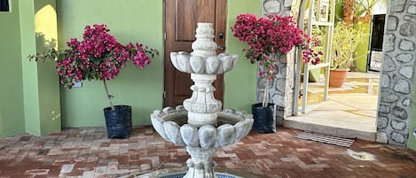 Casita entry with fountain in courtyard
