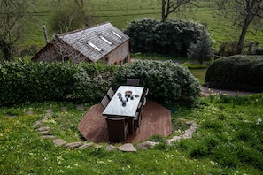 Decked platform in garden perfect for alfresco dining