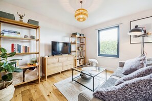 The relaxing living space, enjoy a quiet read or cosy up and watch a film
