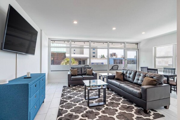 Inviting living room with a comfortable couch and warm accents.