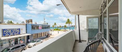 Beyond the balcony, the ocean stretches out like a vast blue canvas. It is a place where one can escape the hustle and bustle of everyday life and simply relax and enjoy the beauty of nature.