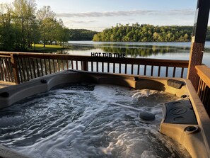 Soak in the private hot tub on the deck over looking the lake. This is the best hot tub spot in all of Branson!
