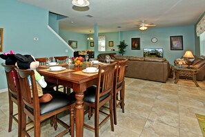  kitchen area and bar table with 8 bar chairs