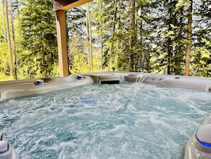 Extra large hot tub with private views of the forest