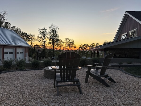 Watch the stunning sunset and enjoy a relaxing evening by the cozy campfire.