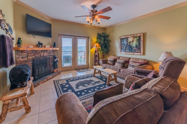 Cozy bear themed living room with balcony access