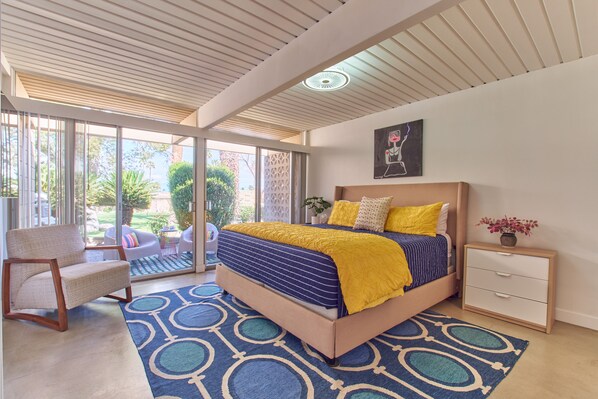 Primary bedroom (California King) with en suite and walk-out patio.