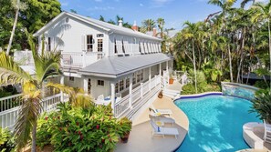 The main house sits next to one of the largest private pools in Key West...