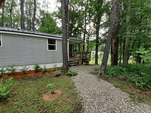 Entrance near the driveway.  Leads to the deck and walkway to front door. 