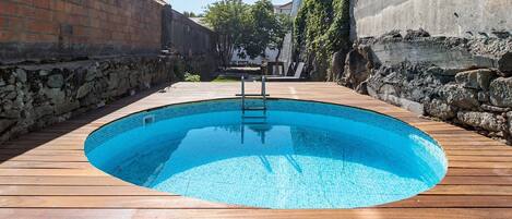 Pool with beautiful wooden deck #airbnb #porto #downtown