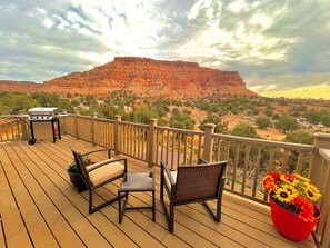 Balcony with BBQ and patio furniture