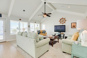 Bright and airy living room with wall of windows