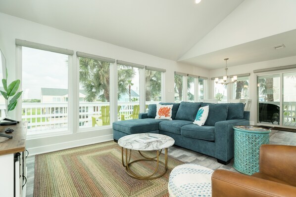Bright and airy living room with wall of windows