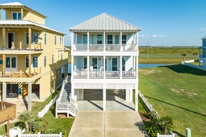 Deep covered porches for slow island afternoons