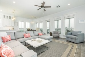 Bright and airy living room with wall of windows