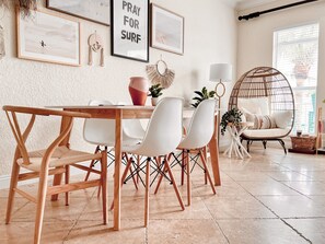 Dining table sits 6 + counter-height bar top in kitchen sits 4