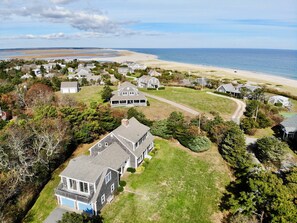 Aerial of yard and surrounding neighborhood - you are just steps from the ocean