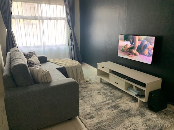 Living room with smart tv and couch