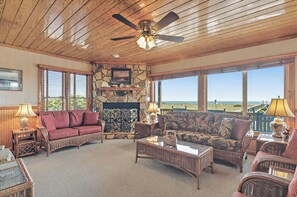 Living Room Area has view of pool, dunes and ocean 