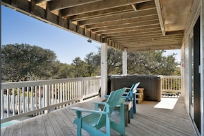 Private hot tub for your enjoyment. The deck overlooks the pool area