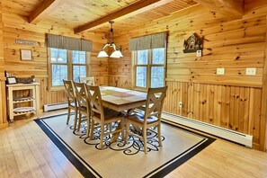 Dining room table area with pond view.