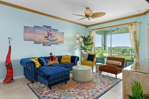 Elegant Living Room with 65in TV overlooking the water and clubhouse!