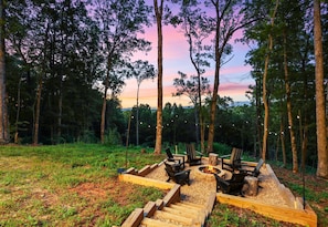 Gather around the fire pit to enjoy breathtaking sunset views and the peaceful ambiance of the mountain setting.