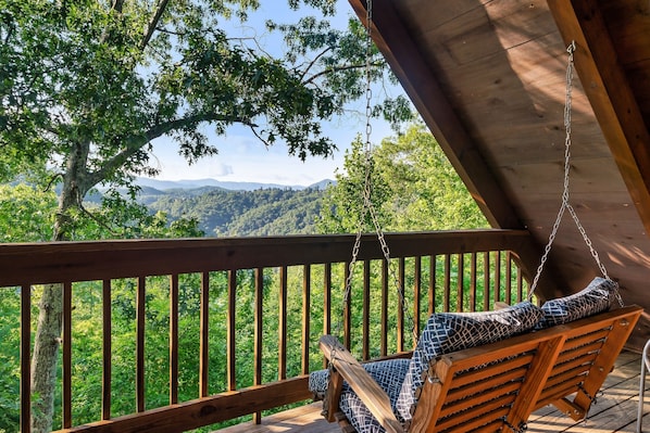 Private upper-level deck with swing and additional seating