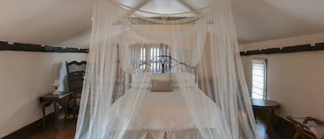 Canopy Room, luxury queen bed. Shares a  hall bath with the master king room