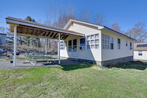 Duplex Exterior | Shared Patio | Picnic Tables | Grill
