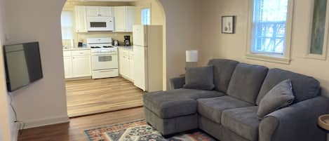 Living room has a 43" Roku TCL Smart TV that guests can log into privately.
