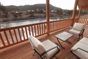 River-facing porch with comfortable seating