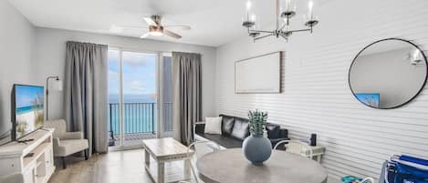 This 2020 Complete Remodel features a bright and open living and dining space with tall ceiling, Gulf views, and new furniture with modern decor around a large 55" Smart TV for all your streaming needs!