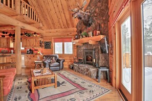 Main living area with wood stove