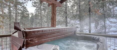 Private hot tub on covered back deck