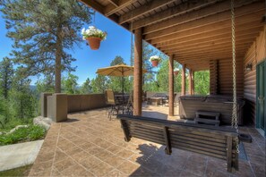 Grand View Lodge deck with view of the pines.