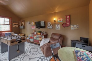 Game room above the garage!  Perfect hangout spot!