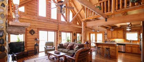 Spacious and beautiful log cabin with open floor plan and loft upstairs bedroom.