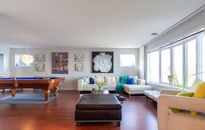 View of Livingroom and Pool table from kitchen