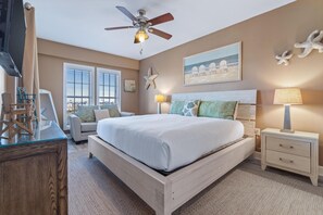 The luxury master suite includes a spacious bedroom with beautiful views of the ocean, a private entry to the balcony, a king size bed, TV/DVD, and ample closet space.