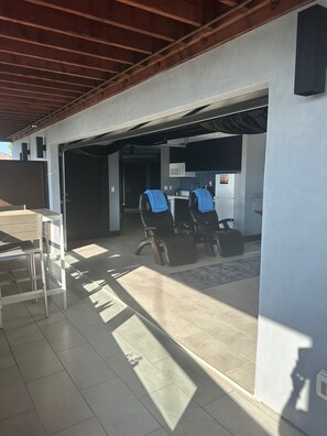 View of garage door open to the patio.