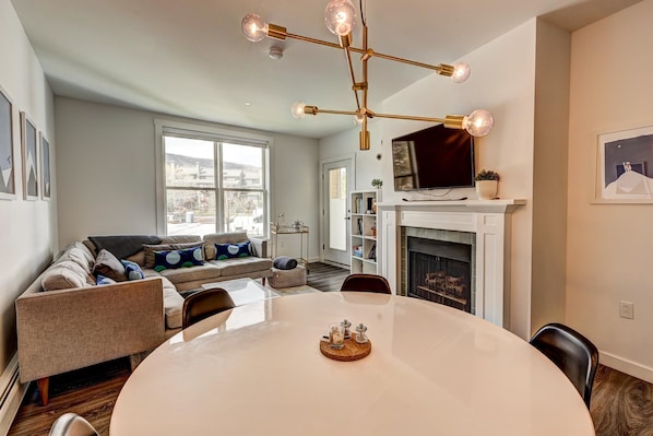 Dining table seats 5-6, Gas fireplace, door to balcony